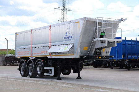 Полуприцеп-зерновоз Тонар-9594 с задней и боковой разгрузкой